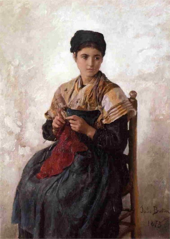 Giovane donna che cuce